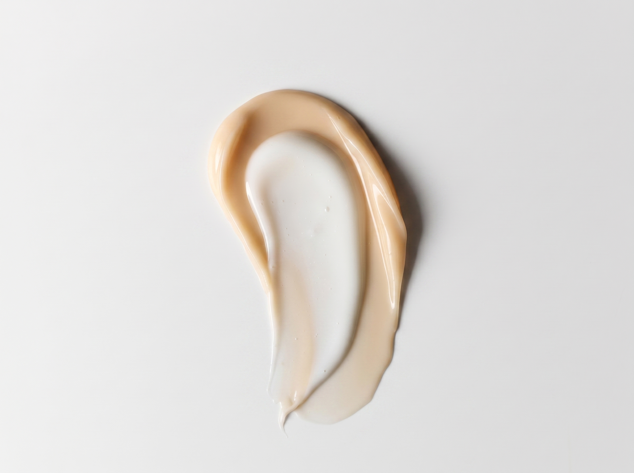 Dermalogica FutureCode Booster serum bottle on a white surface with soft directional lighting, minimal editorial composition